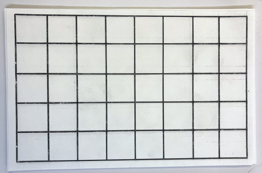 A 8.5" x 5.5" rectangular grid of 1" x 1" raised-line squares made with microcapsule